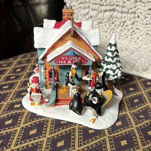 The Disney mint North Pole village hall winter wonderland collection